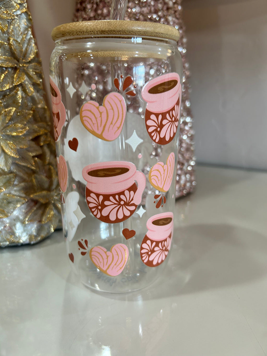 Clear glass tumbler cup with mama and cafecito design.